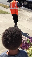 Toddler Spreads Love by Giving Water to Garbage Truck Driver