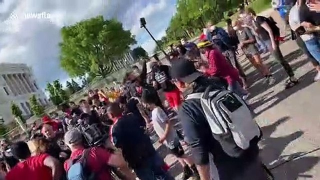 Minnesota crowd celebrates toppling Christopher Columbus statue