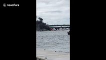 Boat in Massachusetts harbour catches on fire in scary clip