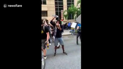 Two women appear to be dragged by police during Black Lives Matter protest in Washington, D.C.