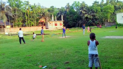 Playing cricket in corona time .