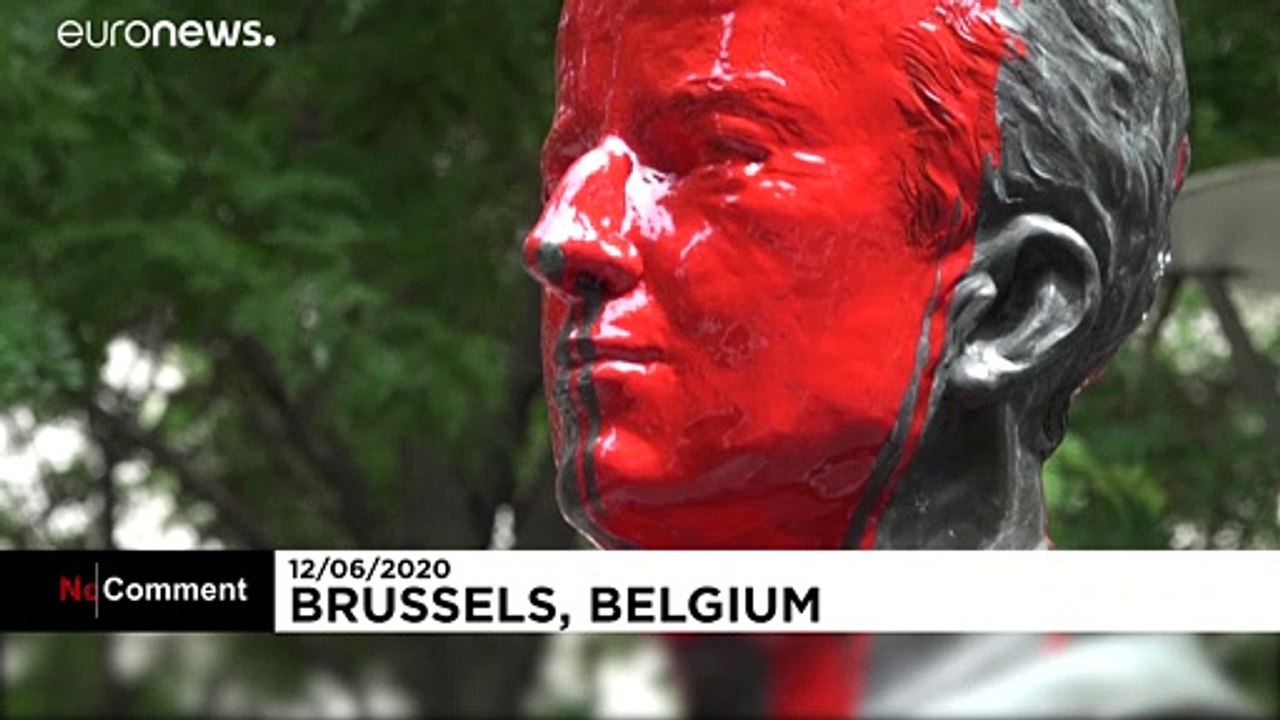 A statue of former Belgian King Baudouin defaced with red paint
