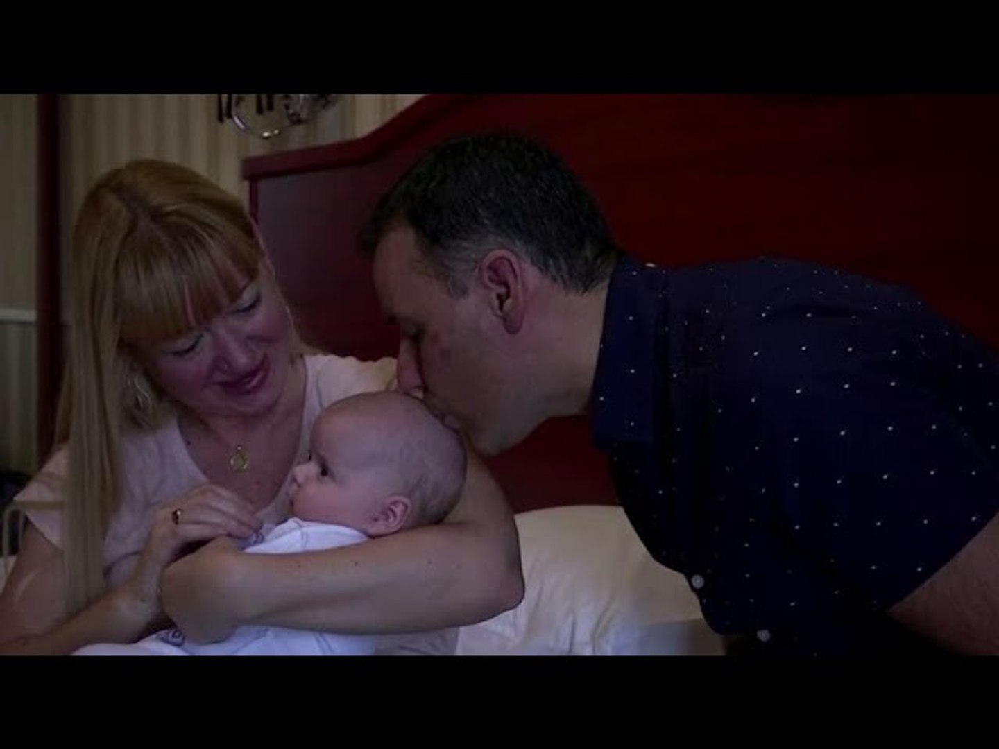 ⁣After long delay, parents finally meet surrogate baby in Ukraine
