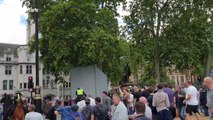Police clash with far-right protesters in Parliament Square close to boarded up statues