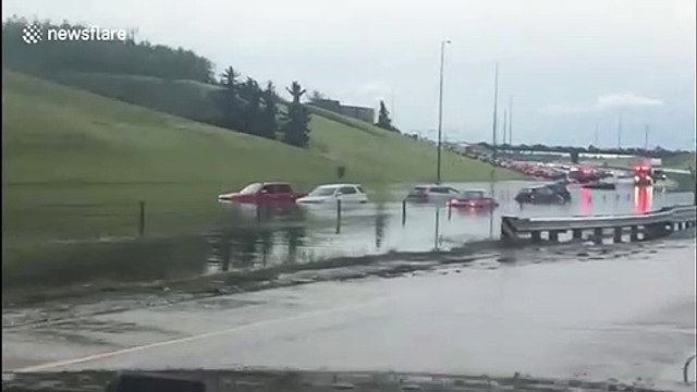 Flash flooding hits Calgary in Canada after tornadoes touch down