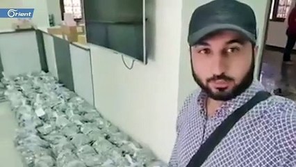 شاهد لحظة وصول كمية من العملة التركية إلى إدلب