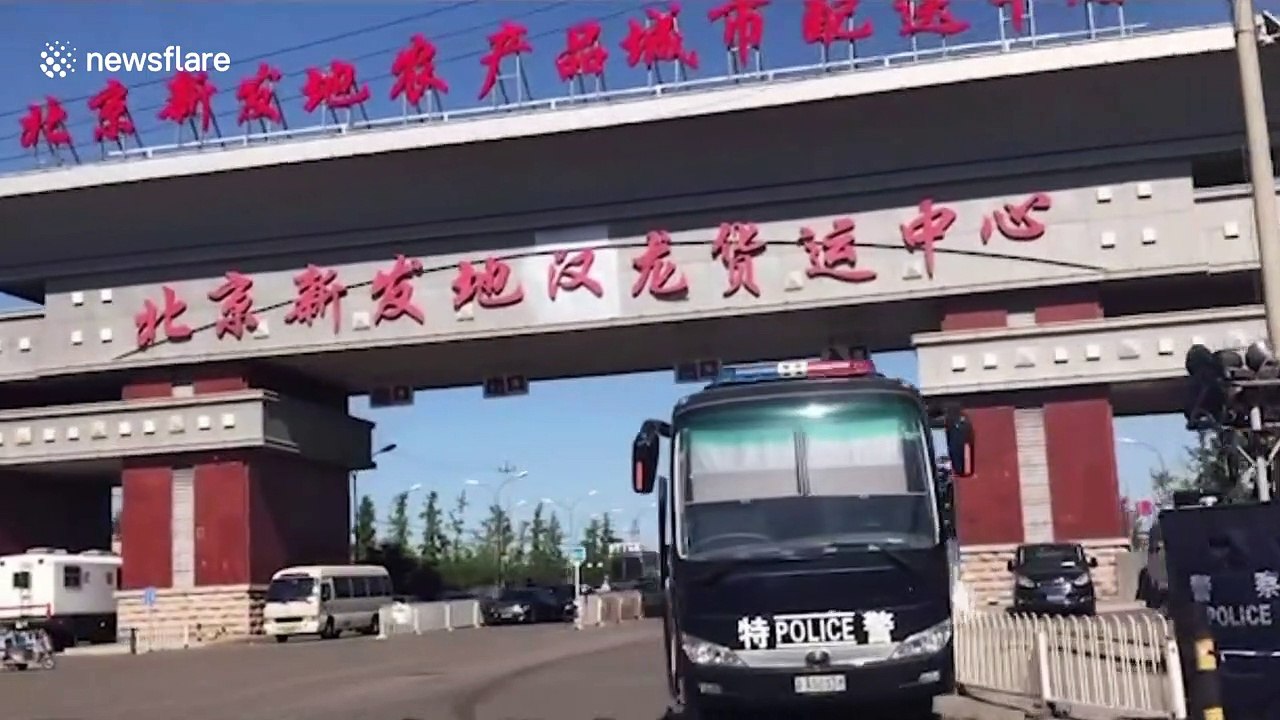 Beijing shuts down market and neighbourhood after new coronavirus cases emerge