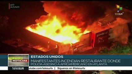 Tras nuevo asesinato de afroamericano incendian restaurante en EE.UU.