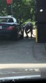 Guy Using Gas at Gas Pump to Clean Car