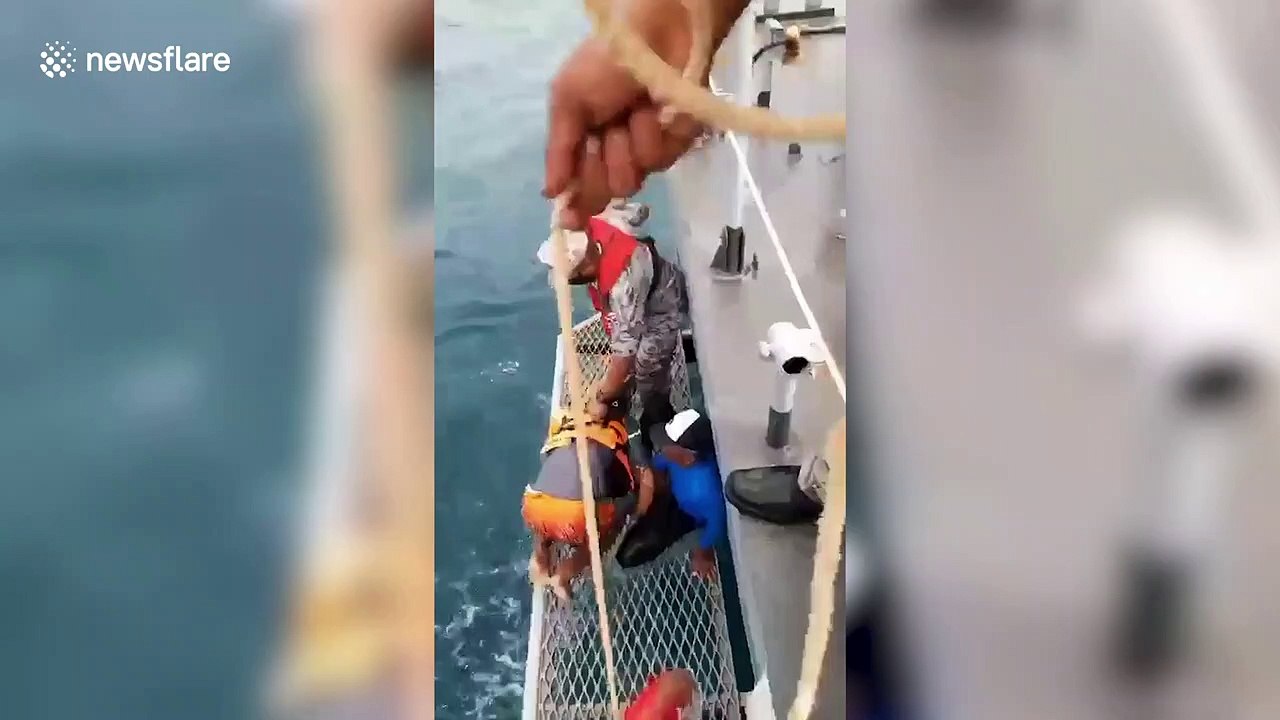 Thai fishermen rescued after boats sink during stormy seas off island