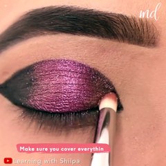 This purple glittery eye makeup look is