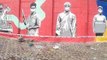 Mumbai : Artists Paint A Wall To Honour 'Corona Warriors' During The Ongoing COVID-19 Lockdown At Mahim