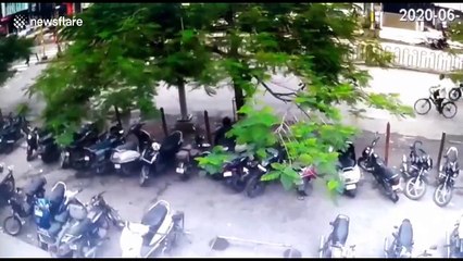 Bus slams into a parking lot injuring two and killing one in western India