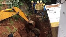 Indian farmers rescue bison trapped in well using excavator