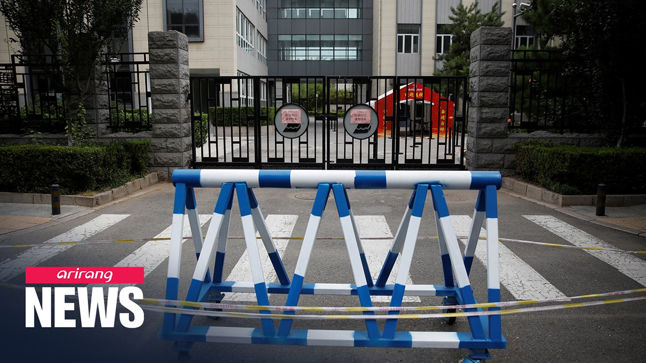 Schools shut in Beijing as city raises health a...