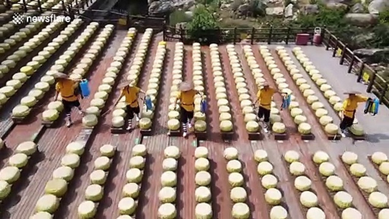 Shaolin monks disinfect stage and audience area to prepare for performance
