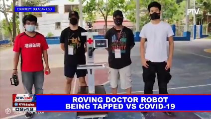 Roving doctor robot being tapped vs CoVID-19