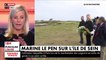 Arrivée en zodiac sur l'île de Sein, Marine le Pen rend hommage au général De Gaulle en déposant une gerbe et avec un court discours