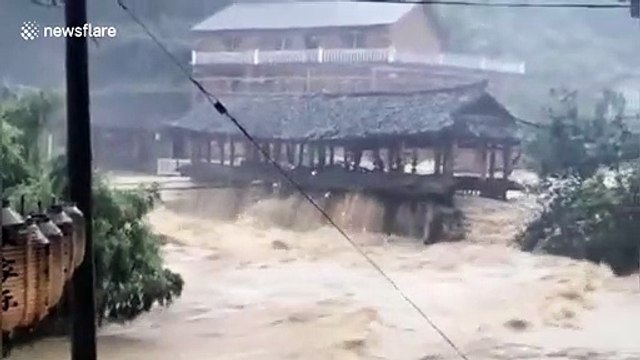 400-year-old bridge washed away by flash floods in southern China