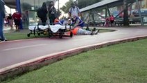 Colisão entre bicicleta elétrica e patinete elétrico deixa mulher ferida no canteiro da Avenida Brasil, no Centro