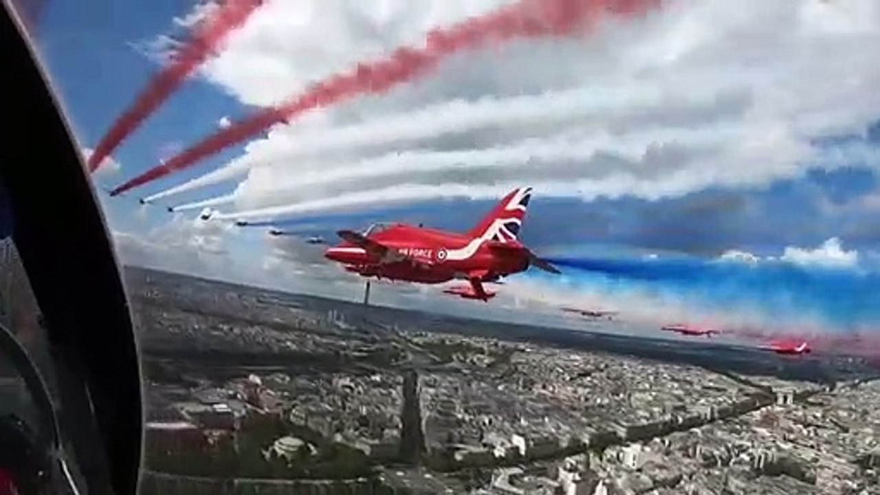 UK's Red Arrows join French counterpart for flypast over Paris