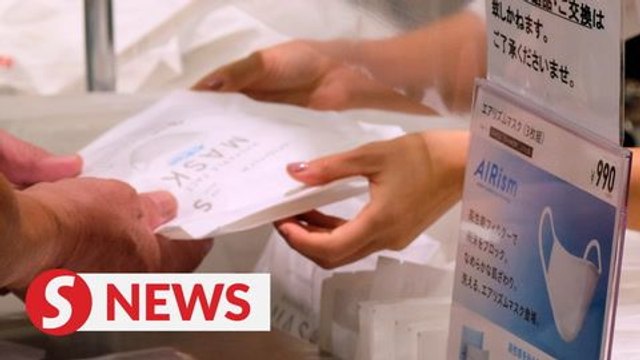 Japan shoppers queue, crash website for Uniqlo's washable masks