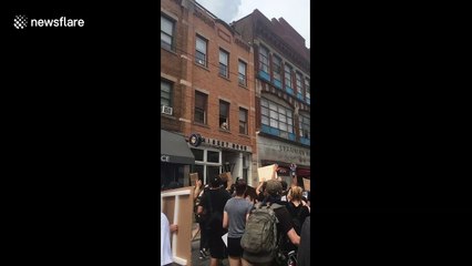 'This pup barks for change!' Dog supports Black Lives Matter with sign