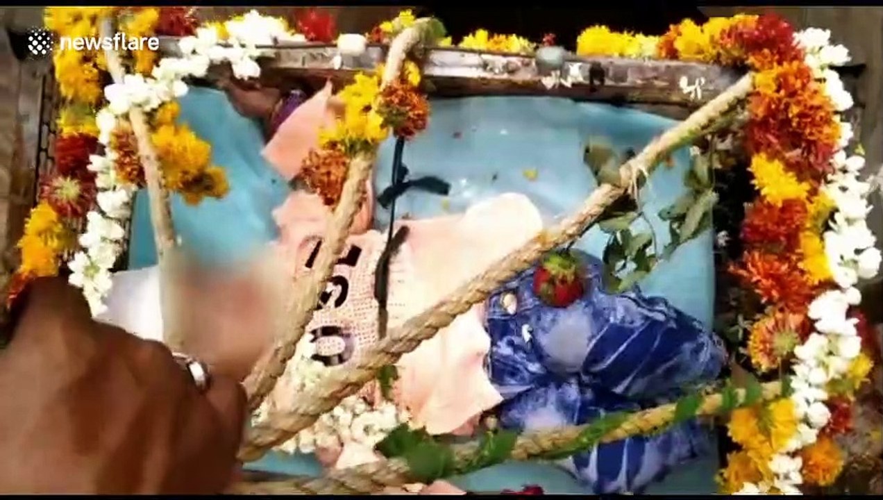 Indian police ban 'superstitious' ritual of lowering babies into wells