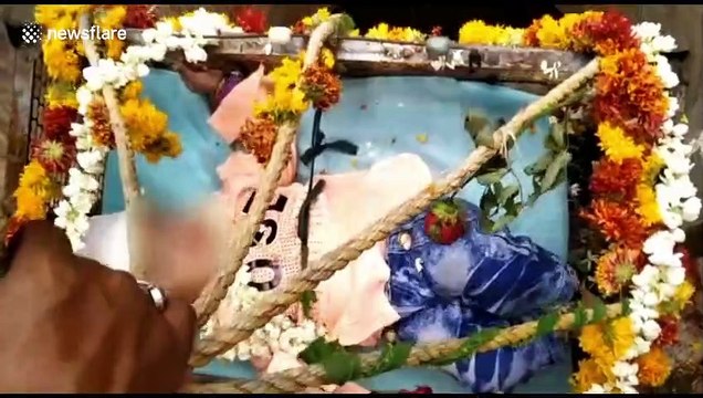 Indian police ban 'superstitious' ritual of lowering babies into wells