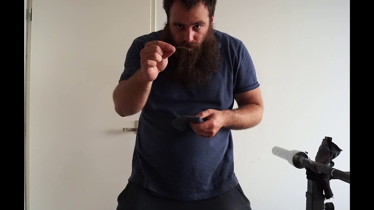 Old time strongman Bending a 2.7 x 55 mm iron nail 2