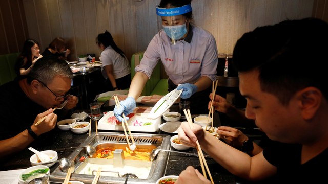 Singaporeans eat out and shop as coronavirus restrictions relaxed