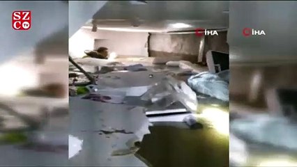 Su basan mağazanın bodrumundaki kadını dalgıç polis kurtardı