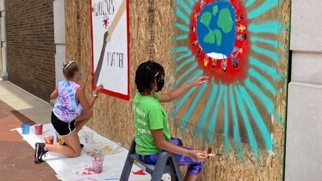 Kids Paint Murals On Boarded Up Businesses