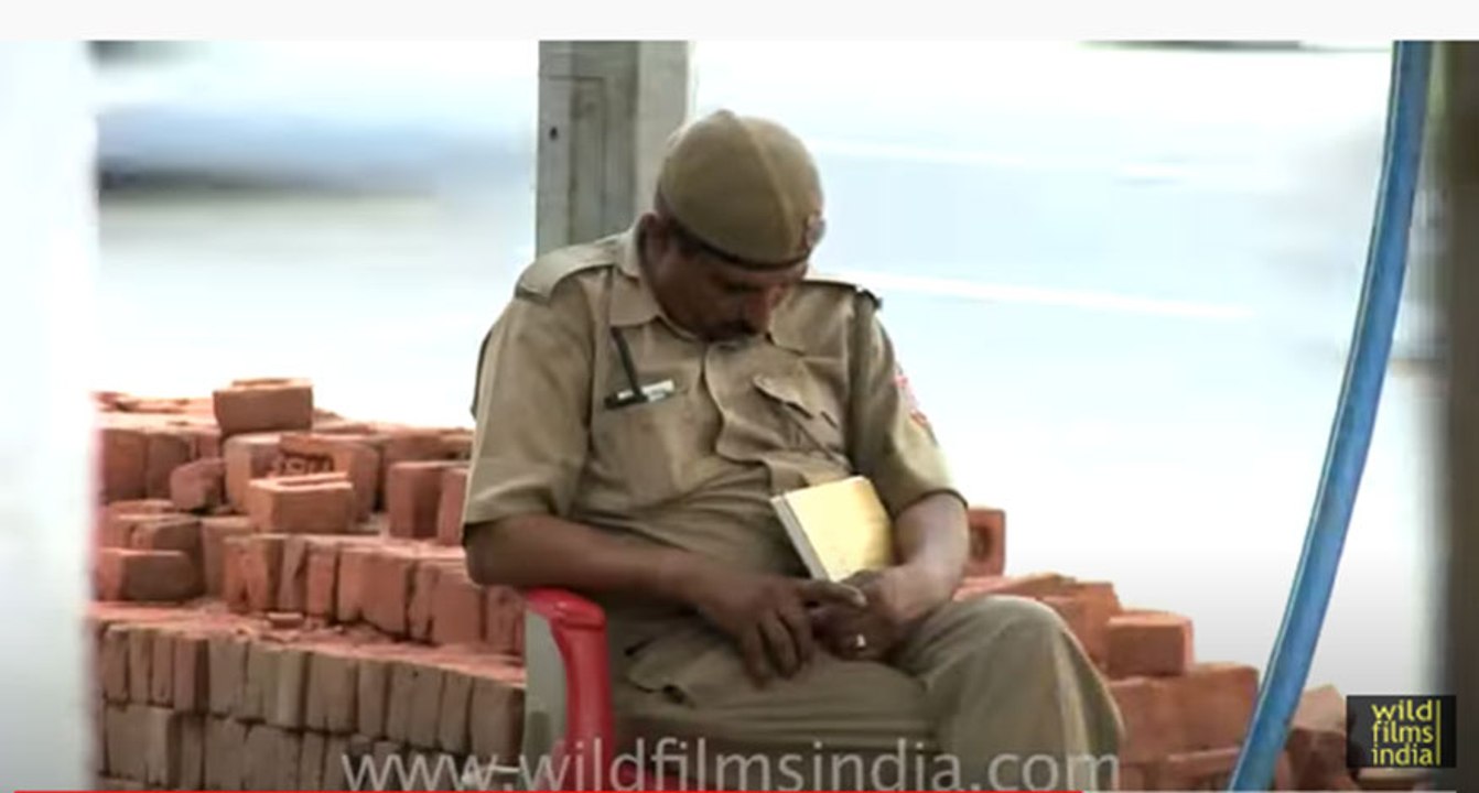 Cop sleeping on duty, in India