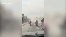 Indonesia volcano Mount Merapi spews hot ash over drivers after erupting