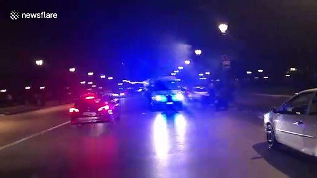 Bottles launched at police in Paris after music festival