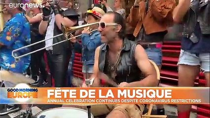 Parisians dance on the streets and cram into bars for the city's summer music festival