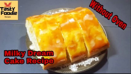 Descargar video: Milky Deram Cake Without Oven Recipe - Caramel Milky Cake Easy Recipe No Oven - Tasty Foodie