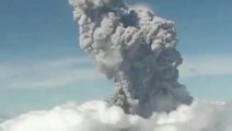 Volcano violently erupts sending debris into sky