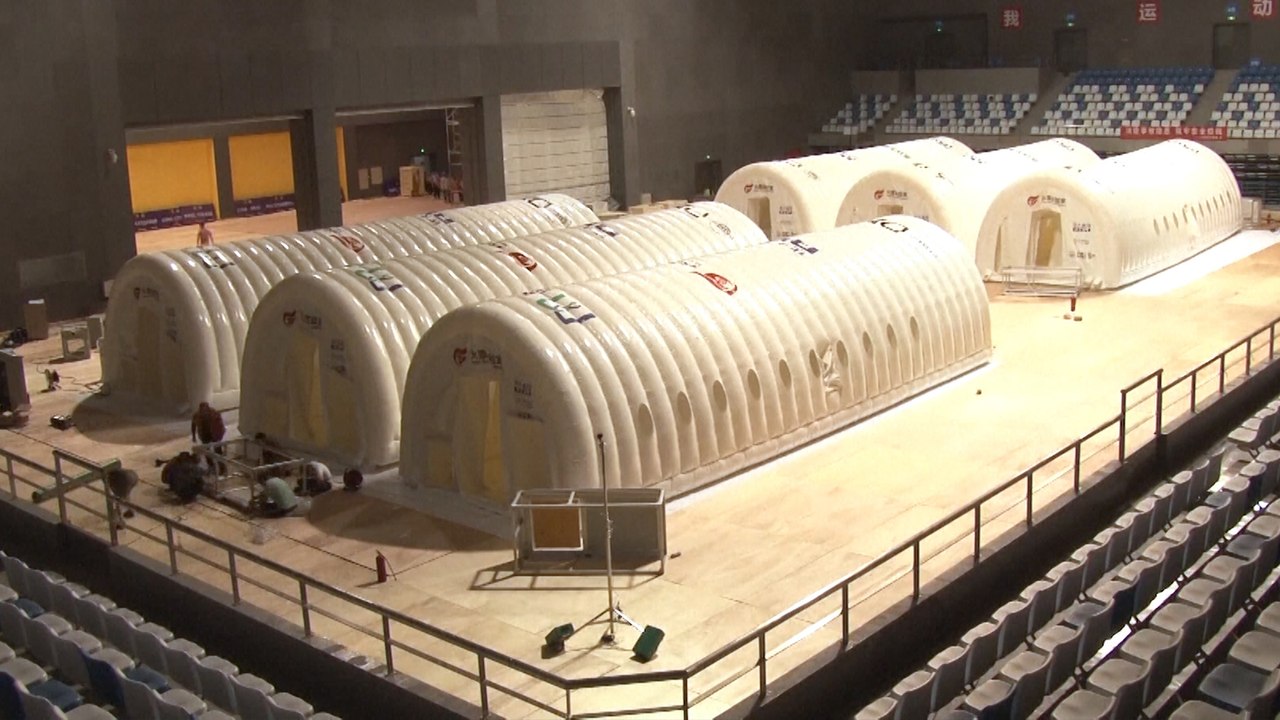Beijing to open a mobile, inflatable Covid-19 v...