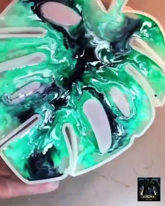 Casting epoxy resin with added inks. Wait until you see the tinket box at the...