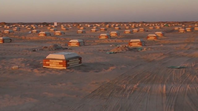 Forces fighting Islamic State in Iraq helping to bury coronavirus victims in mass graves