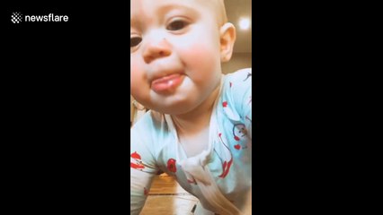 Baby goes viral after stealing the show during mom's home workout videos