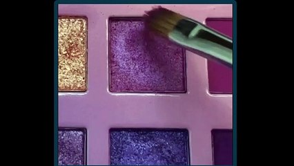 glittery purple makeup look in fashion trends