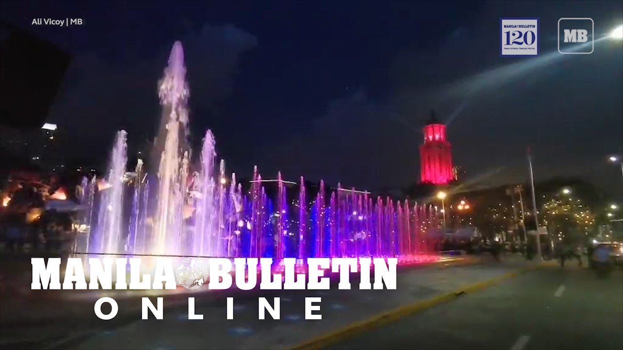 A red light illuminates the Manila City hall for the founding anniversary of the city
