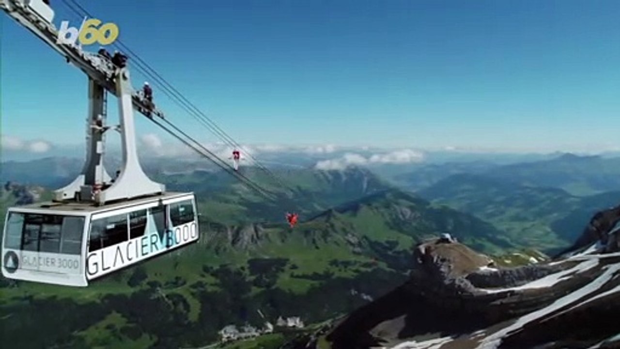 Don’t Look Down! Acrobat Rides Bike, Walks Blindfolded Nearly 10,000 Ft. in the Air