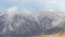 Dust clouds form from mountains after earthquake