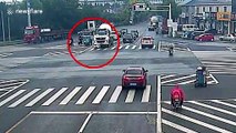 Mixer truck drags elderly Chinese woman along road after she runs red light