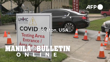Long lines at Houston virus test drive-thru as cases surge