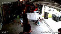 Security camera captures moment South Carolina 2-year-old 'rides' garage door as it slides up